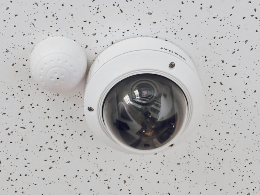 A CCTV camera on an office ceiling