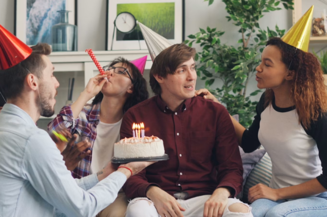 Employees throwing a birthday party